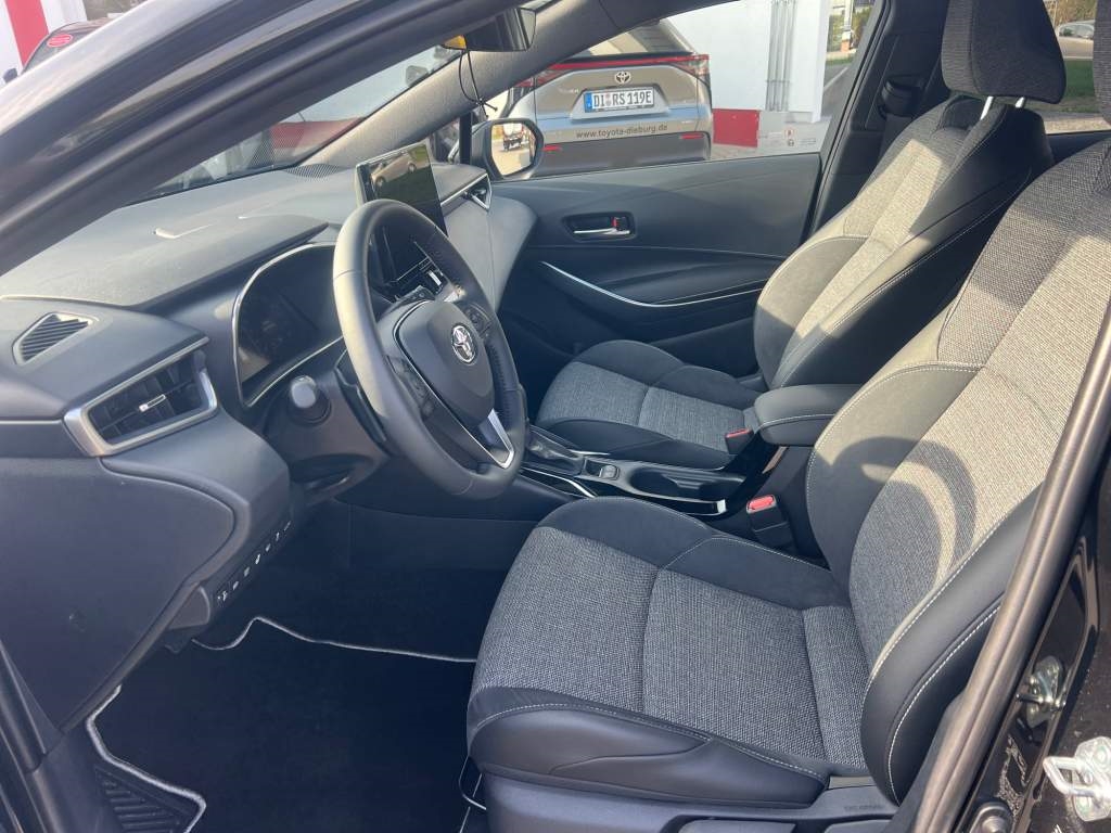 Foto 1 - Corolla Touring Sports 2,0 l Hybrid TS, Teamplayer, black mica / ink (schwarz)