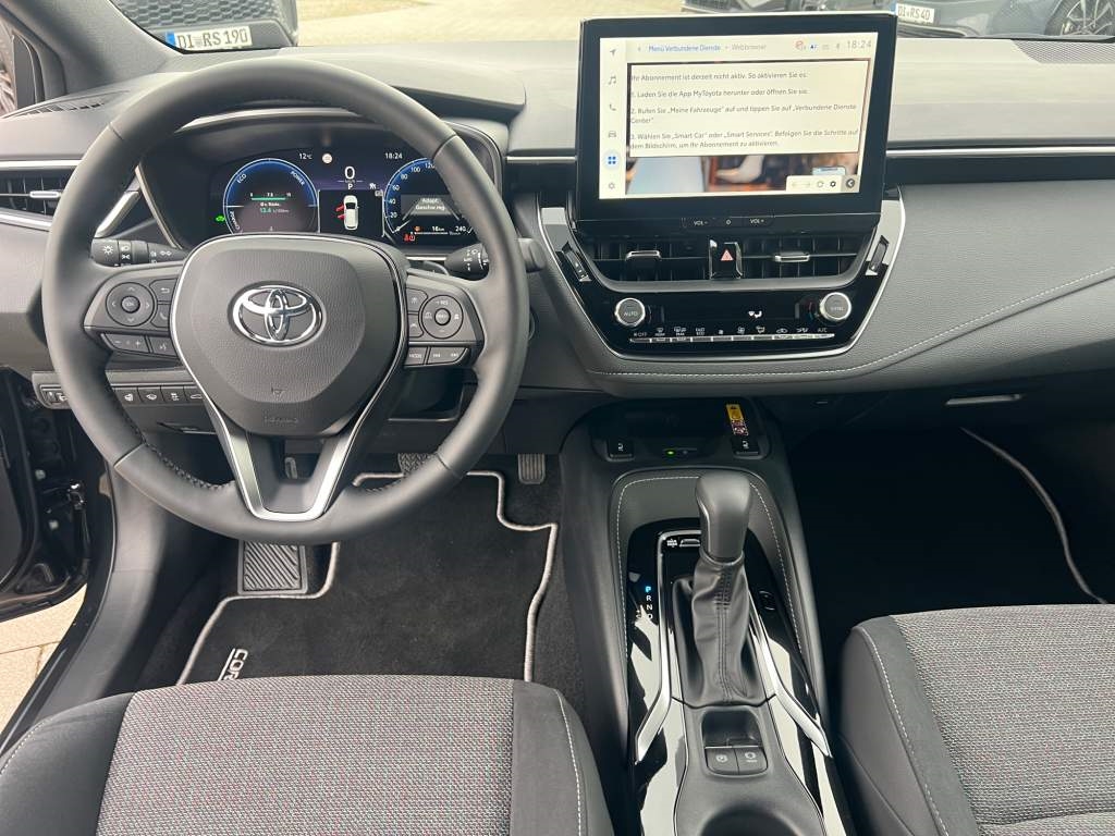 Foto 1 - Corolla Touring Sports 2,0 l Hybrid TS, Teamplayer, black mica / ink (schwarz)