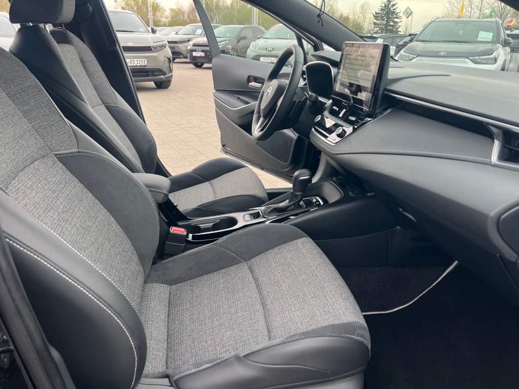 Foto 1 - Corolla Touring Sports 2,0 l Hybrid TS, Teamplayer, black mica / ink (schwarz)