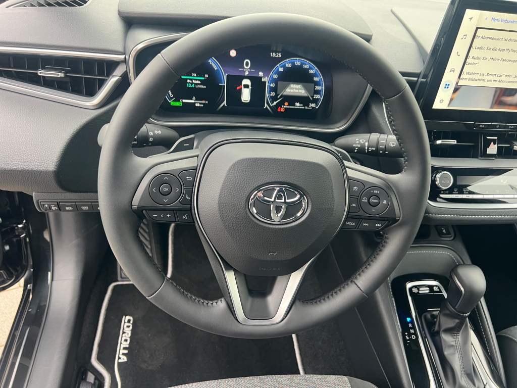 Foto 1 - Corolla Touring Sports 2,0 l Hybrid TS, Teamplayer, black mica / ink (schwarz)