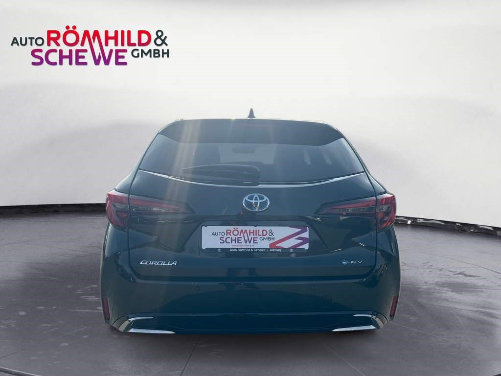 Foto 1 - Corolla Touring Sports 2,0 l Hybrid TS, Teamplayer, black mica / ink (schwarz)