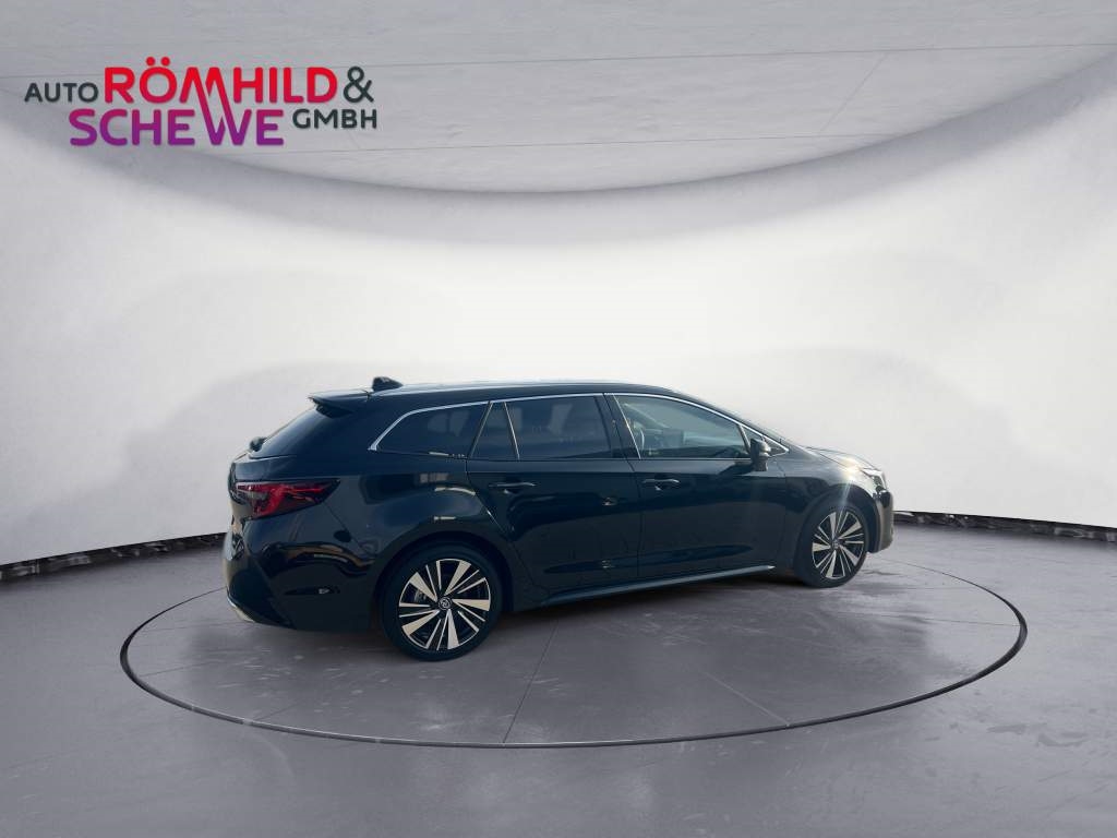 Foto 1 - Corolla Touring Sports 2,0 l Hybrid TS, Teamplayer, black mica / ink (schwarz)