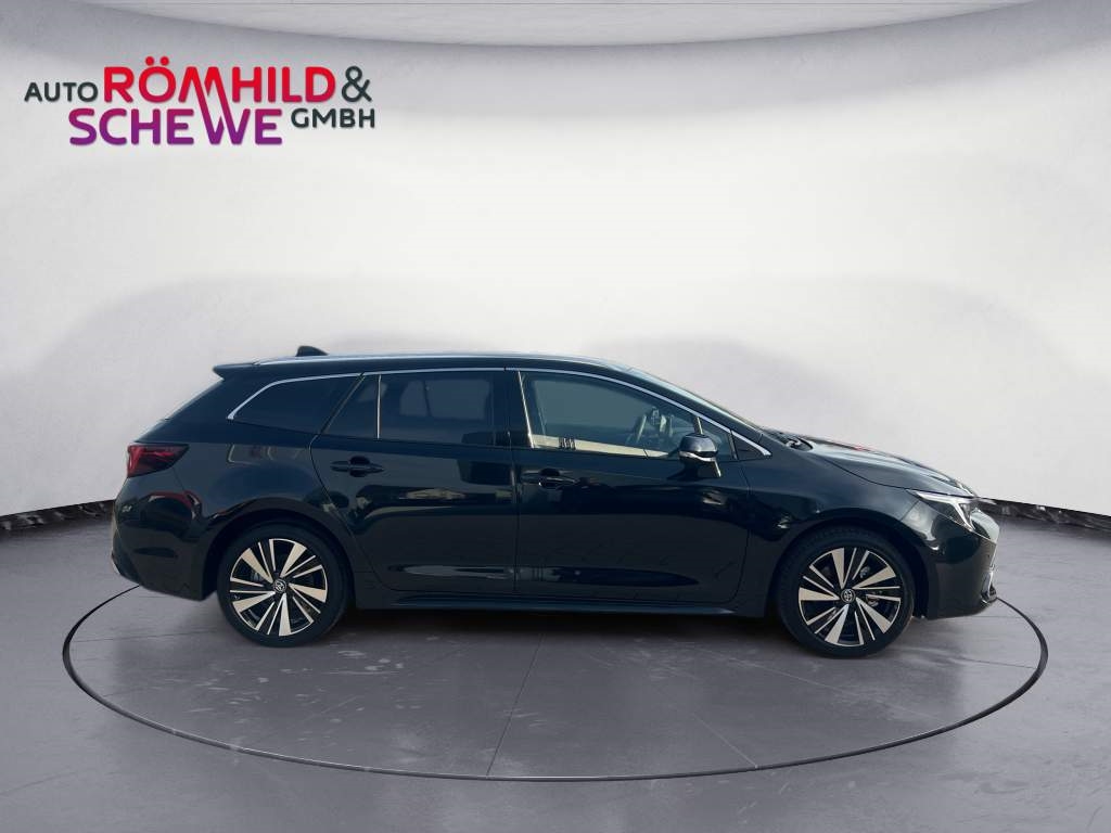 Foto 1 - Corolla Touring Sports 2,0 l Hybrid TS, Teamplayer, black mica / ink (schwarz)